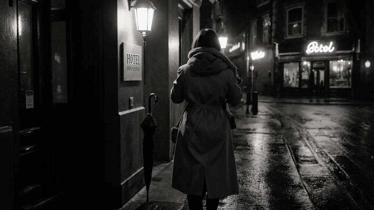 A woman leaves a discreet London hotel at night, her silhouette framed by soft urban lighting.